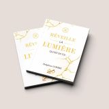 2 livres superposés de Delphine Combe réveille la lumière qui est en toi